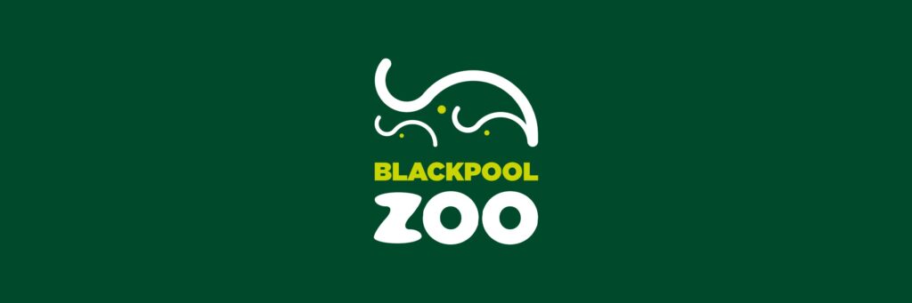Banner con el logotipo de Blackpool Zoo y un icono de elefante sobre fondo verde oscuro