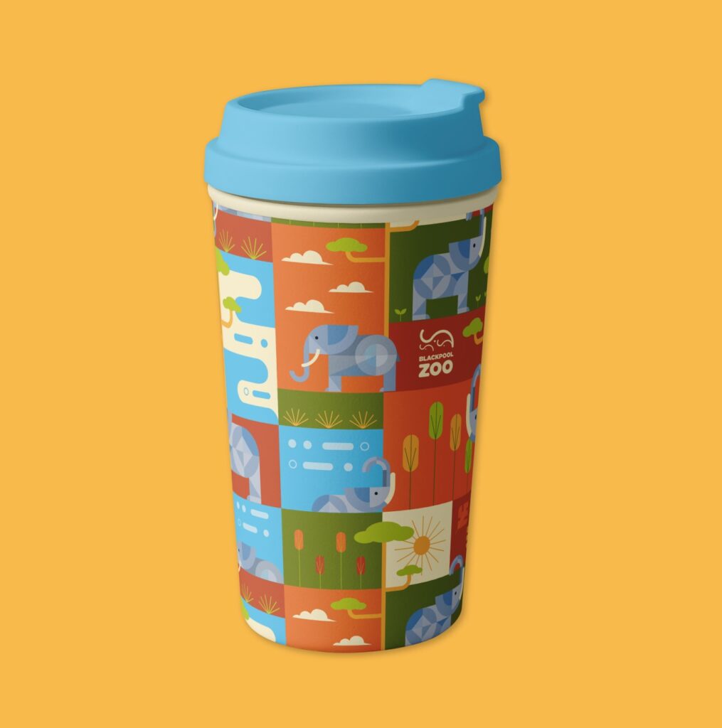 Vaso térmico naranja con un patrón de elefantes