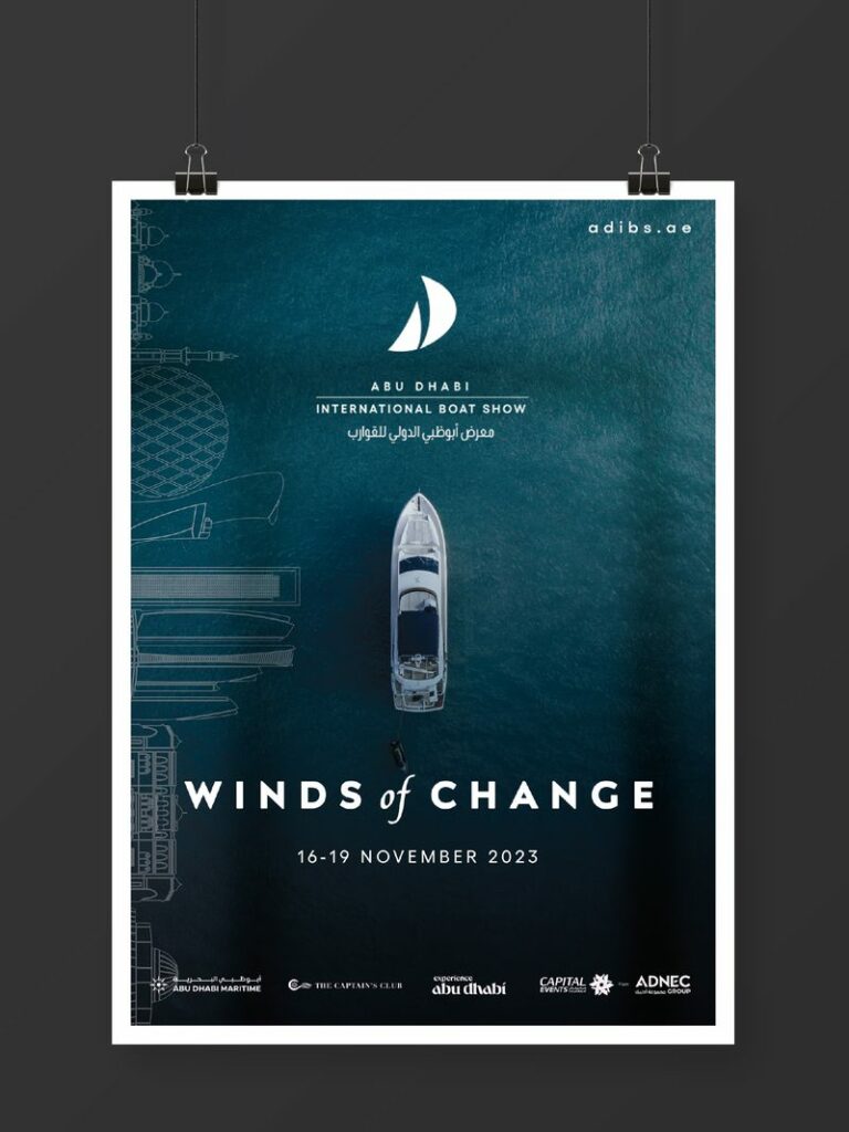 Cartel "Winds of Change" del Abu Dhabi International Boat Show, con una lancha vista desde arriba sobre el mar